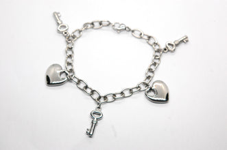 ESBL 9003: S/S Solid 2 Heart 3 Key Blet