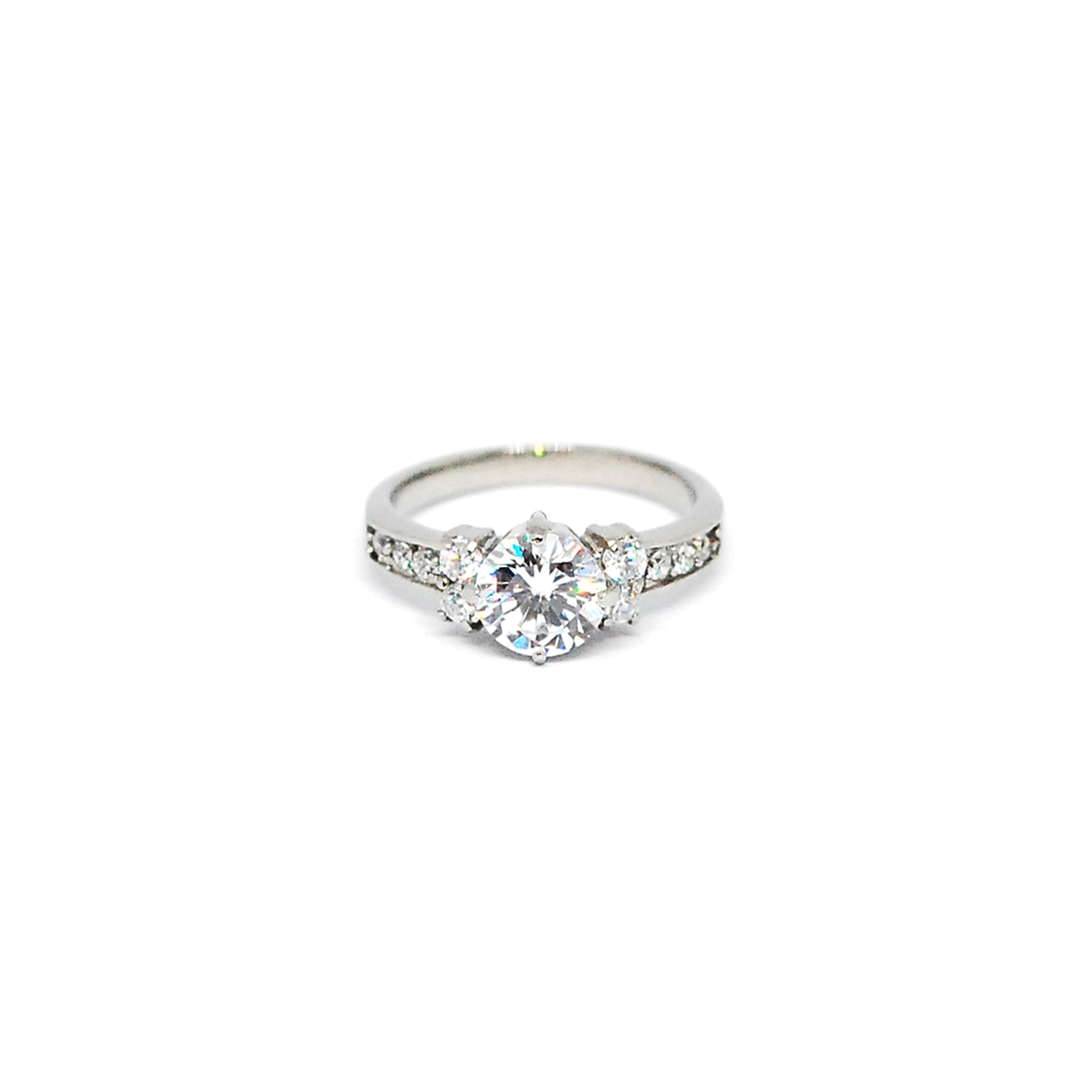 ESR 7560: Christina 7mm Cubic zirconia Center Ring with 4 x 2mm Cubic ziconia Accents & Paved Sides Ring