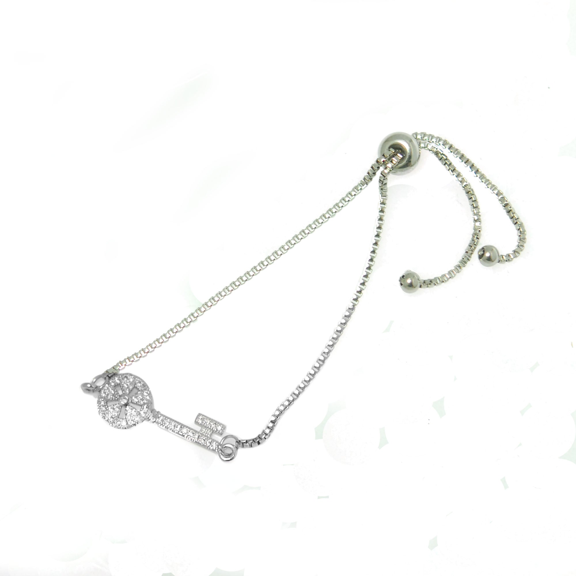 ESBL 5835: Cubic Zirconia-Studded Lucky Key Adjustable Bracelet