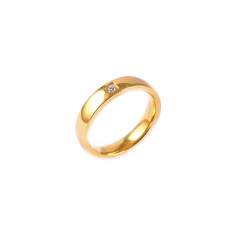 ESR 7799: Michelle Flat Gold Plated 4mm Band w/ 1 Cubic Zirconia Center